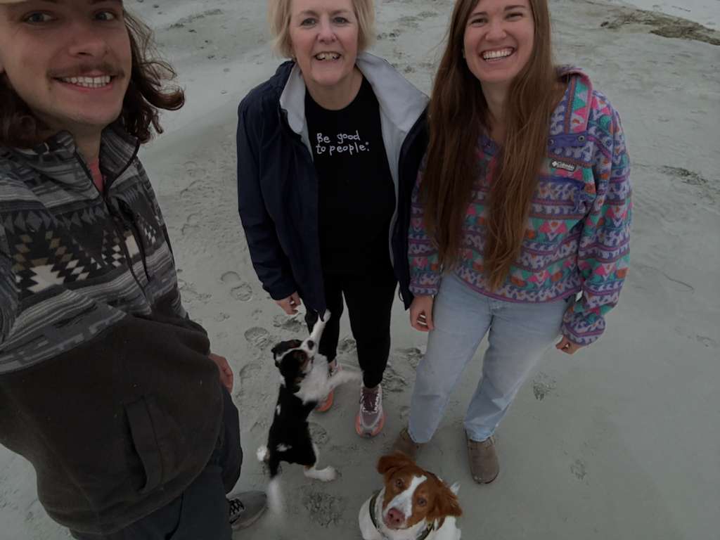 Molly, Ethan, and Rebeca with dogs Zip and Rooster on one of Hilton Heads beach